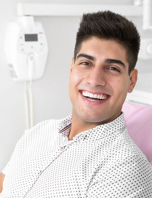 young-man-smiling-at-exam